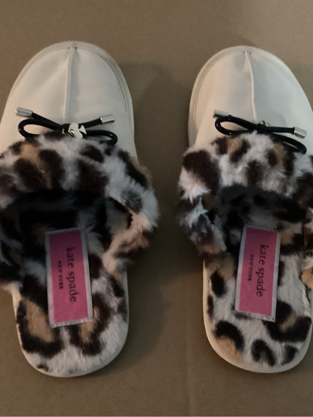 kate spade White Slide Slippers with Leopard Faux-Fur Trim and Black Bow